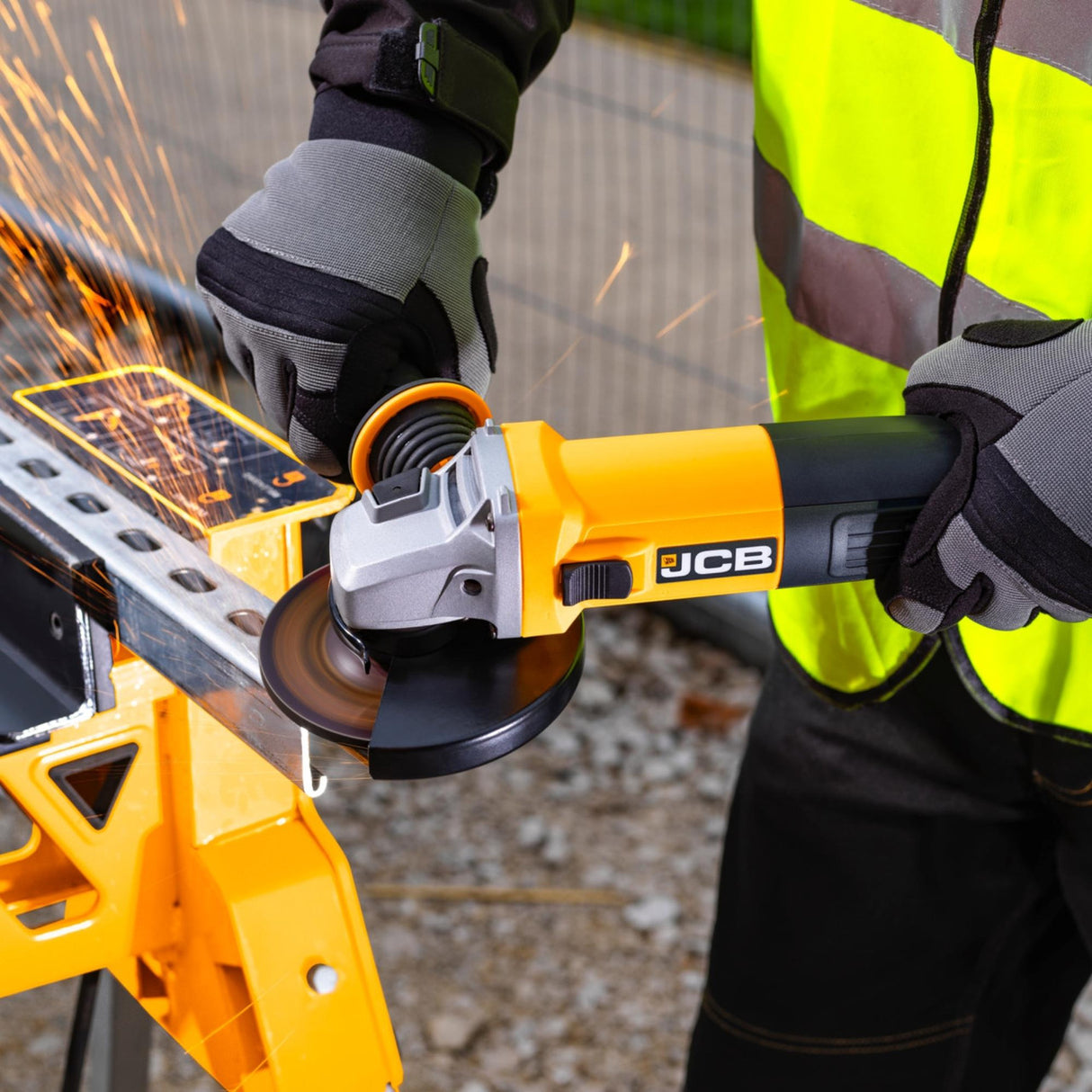 JCB 21-AG125 Angle Grinder in use
