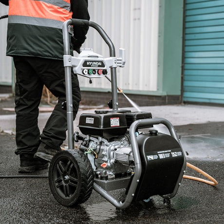 In use: Hyundai 209cc 3400psi Petrol High-Pressure Washer, 5 Nozzle Attachments, Axial Pump, 10m Hose & 5L Detergent Tank | HYW3400P