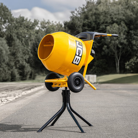 In use JCB 110V 134L Seam Welded Tip Up Cement Mixer 550W Electric Motor | JCB-CM150E-110
